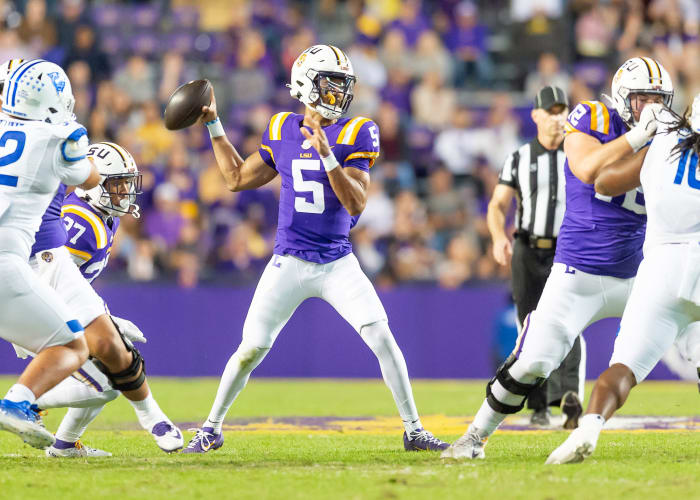 Quarterback Jayden Daniels 5 throws a pass as the LSU Tigers take on Georgia State in Tiger Stadium in Baton Rouge, Louisiana, November 18, 2023.